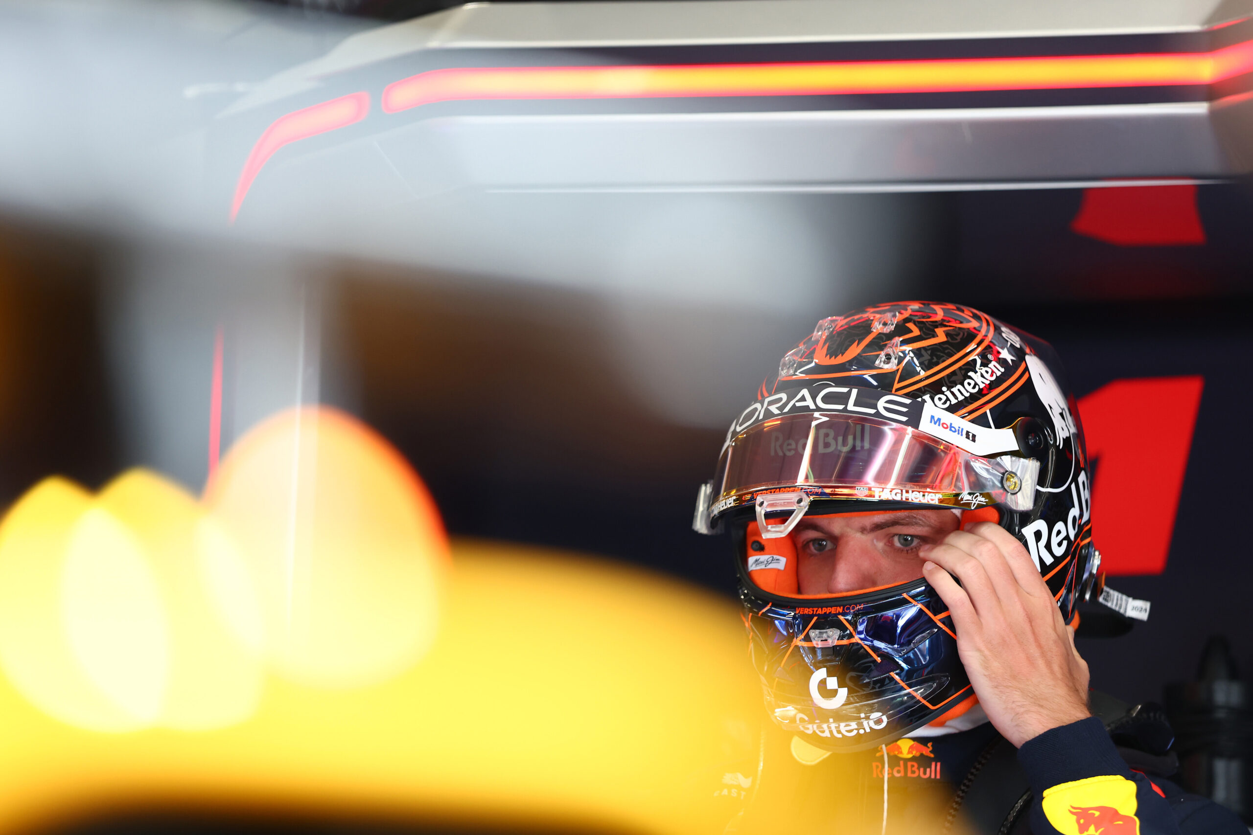 Max Verstappen with his helmet on